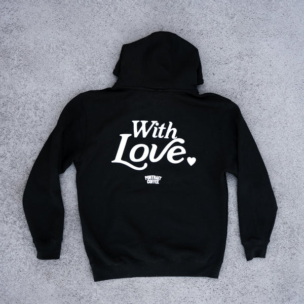 Black hoodie with 'With Love' text on a gray surface