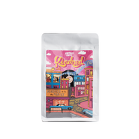 Coffee package with colorful illustration and 'Kindred' branding on a white background