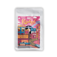 Coffee package with colorful cityscape design on a white background